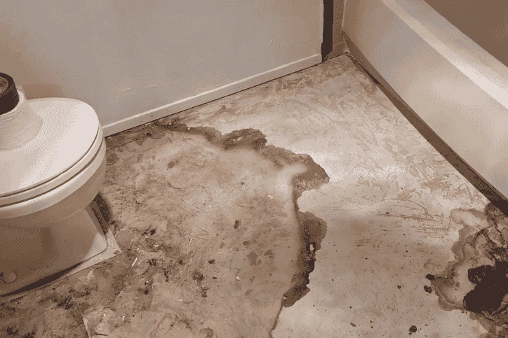 Water leaking from under bathroom sink causing floor damage