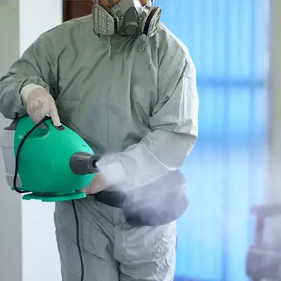 Certified technician performing expert dry fog disinfection in Melbourne