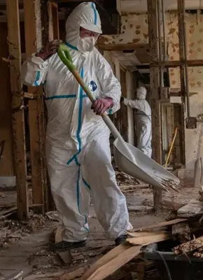 Team clearing fire-damaged debris from a Melbourne property