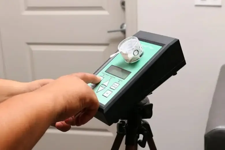 Air sampling equipment set up in a damp indoor environment