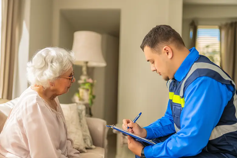 Professional preparing detailed restoration report for insurance claim in Victoria
