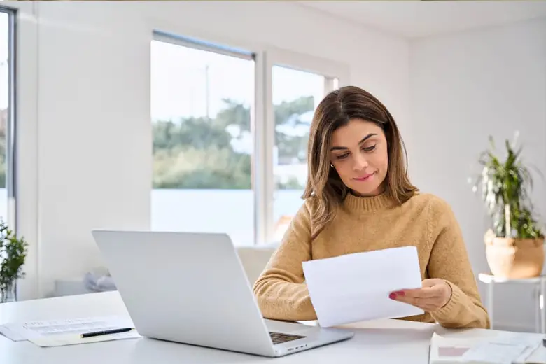Expert reviewing restoration documents before insurance claim submission in Victoria