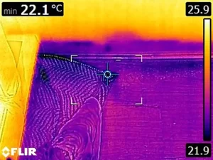 FLIR thermal scan showing dampness in a wooden floor, indicating hidden moisture beneath the surface in a Melbourne home.