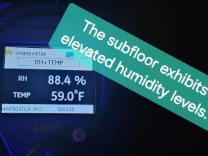 Moisture meter showing elevated humidity levels in the damp subfloor area of a Melbourne property.