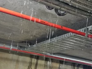Water leaking from a damaged ceiling that led to indoor flooding in a Melbourne property.