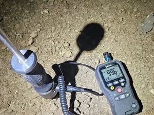 Moisture inspection being carried out below the subfloor of a Melbourne property to detect damp conditions.