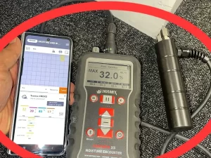 Moisture meter used to perform analysis inside a wall during water damage inspection in a Melbourne property.