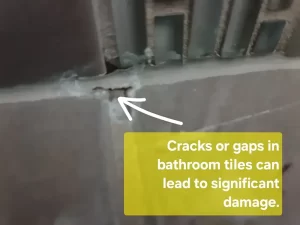 Close up of small cracks in bathroom tiles that can allow water seepage and lead to hidden damage in a Melbourne property.