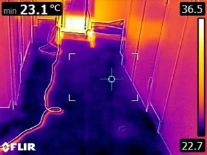Thermal scan highlighting areas of excessive moisture on a flooded floor in a Melbourne property.