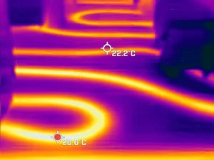 Thermal imaging scan revealing hidden moisture in the floor of a water damaged property in Melbourne.