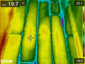 Thermal scan image showing moisture buildup in a wet wooden floor inside a Melbourne property.