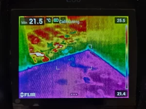 Thermal imaging scan revealing hidden water damage beneath the flooring surface in a Melbourne property.