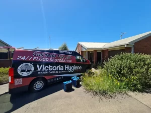 Victoria Hygiene van parked outside a water damaged home in Melbourne with restoration equipment ready for deployment.