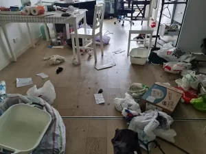 Melbourne apartment showing extensive water damage after a ceiling burst, with visible wet surfaces and structural impact.