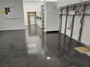 Water pooling on a floor after a severe leak and flooding incident in a Melbourne property.