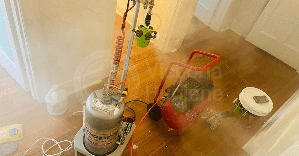 Illustration of the dry fogging disinfection process with fine mist sanitizing indoor space in Melbourne